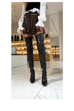 HIGH BOOTS MADE OF GENUINE BLACK LEATHER WITH DECORATIVE LACING ON BUTTONS